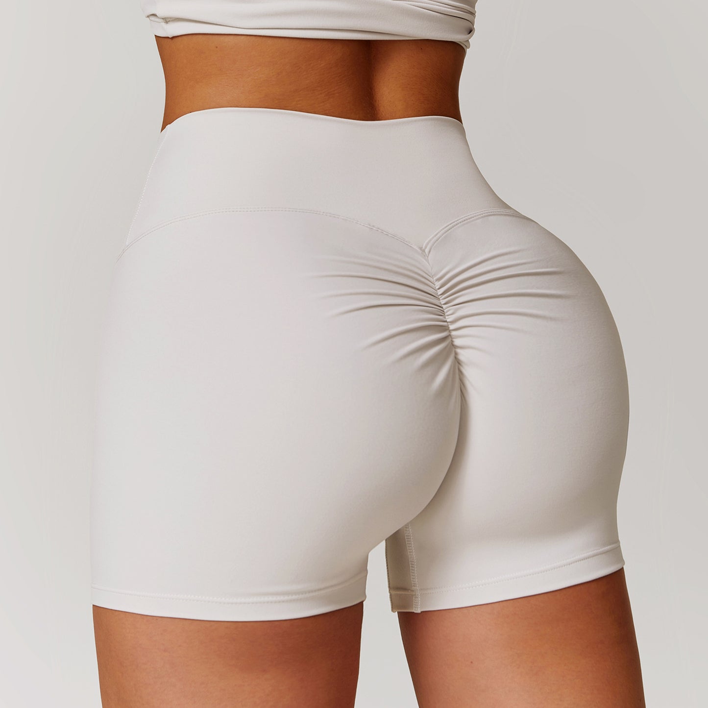 Shaved high waisted yoga shorts, cinching belly, peach lifting buttocks, running and fitness pants, tight fitting sports shorts